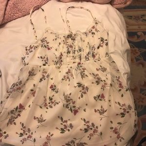 white blouse with purple flowers